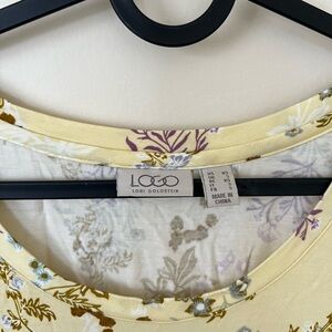 Logo by Lori Goldstein beautiful yellow summery dress! 💛